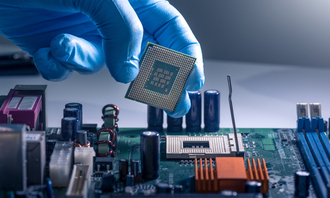 Technician installing a CPU. The CPU is essential for the concept of computer marketing, repairing, electronics, service, upgrade, hardware and technology.